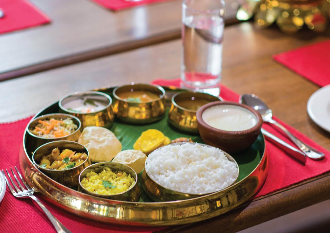 Отель Amutham Residency Tiruchirappalli Экстерьер фото