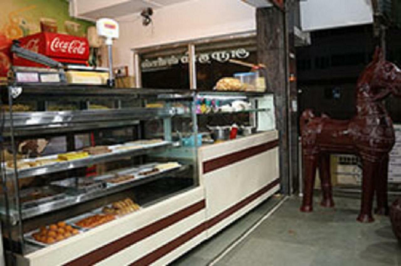 Отель Amutham Residency Tiruchirappalli Экстерьер фото